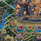 Close up of Ekajati Thangka Painting showing a wrathful female protector deity surrounded by flames, dark clouds.