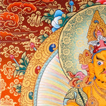 Zambala Thangka Painting showing the Tibetan Buddhist wealth deity seated on a pink lotus throne with a jewel-spitting mongoose, fruit offering, radiant halo, sacred ornaments