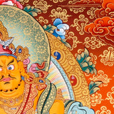 Zambala Thangka Painting showing the Tibetan Buddhist wealth deity seated on a pink lotus throne with a jewel-spitting mongoose, fruit offering, radiant halo, sacred ornaments