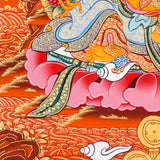 Zambala Thangka Painting showing the Tibetan Buddhist wealth deity seated on a pink lotus throne with a jewel-spitting mongoose, fruit offering, radiant halo, sacred ornaments