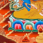 Vajrapani thangka painting showing a blue wrathful Tibetan Buddhist protector deity holding a raised vajra, surrounded by flames and seated on a lotus throne against a vivid orange-red background.