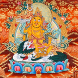 Singh Zambala Thangka Painting showing the Tibetan Buddhist wealth deity seated with a snow lion, jewel-spitting mongoose, sacred vase, lotus throne, radiant halo