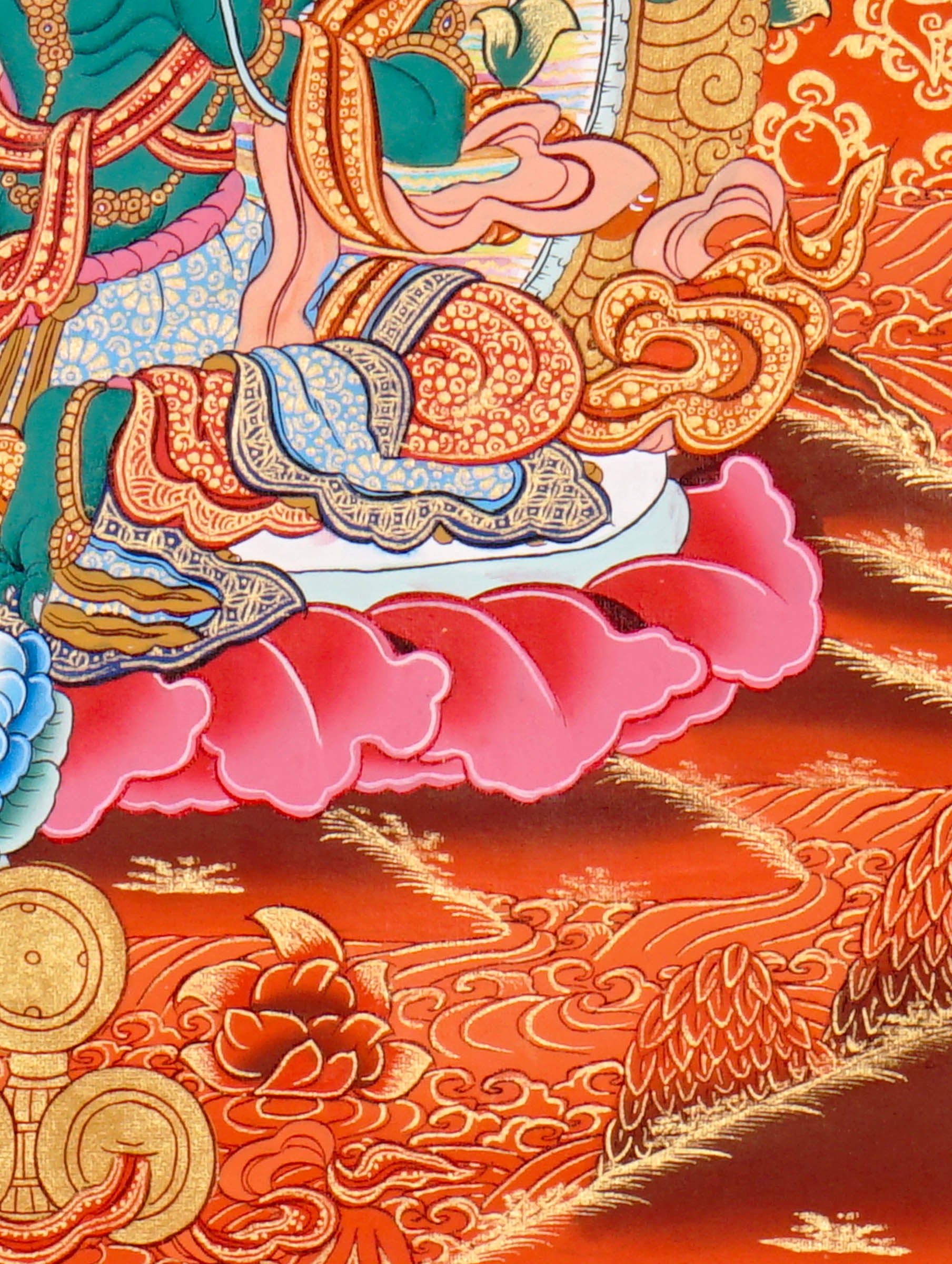 Green Tara Thangka Painting showing the Tibetan Buddhist goddess seated on a pink lotus throne with one leg extended, holding a lotus flower, surrounded by a radiant halo, sacred ornaments and red-gold background.
