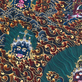 Close-up detail of Yamantaka Thangka Painting, wrathful Yamantaka with multiple faces, protector figures and flame clouds