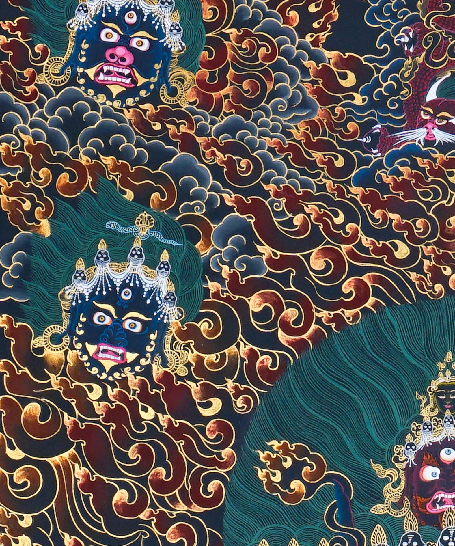 Close-up detail of Yamantaka Thangka Painting, wrathful Yamantaka with multiple faces, protector figures and flame clouds
