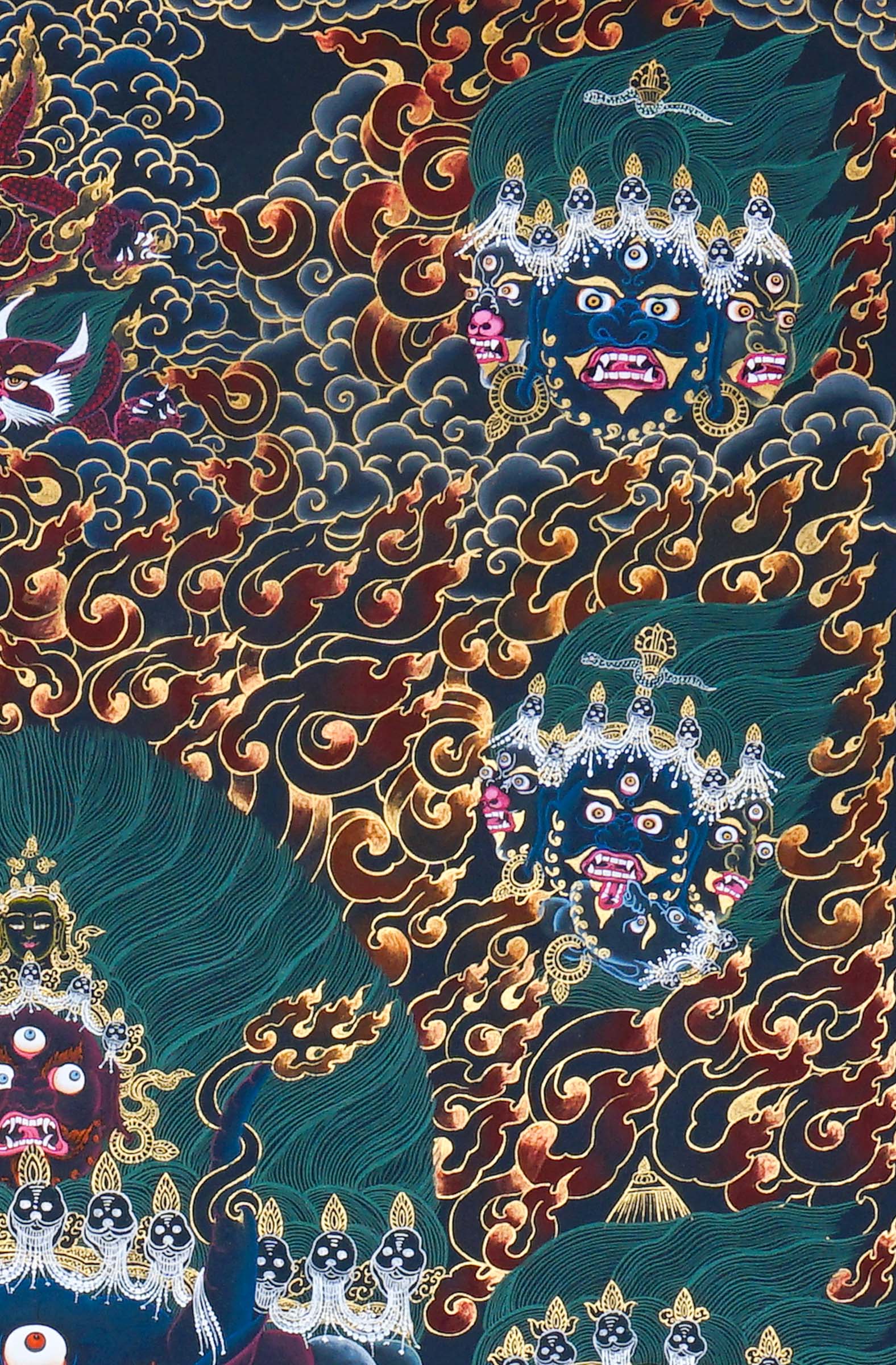 Close-up detail of Yamantaka Thangka Painting, wrathful Yamantaka with multiple faces, protector figures and flame clouds