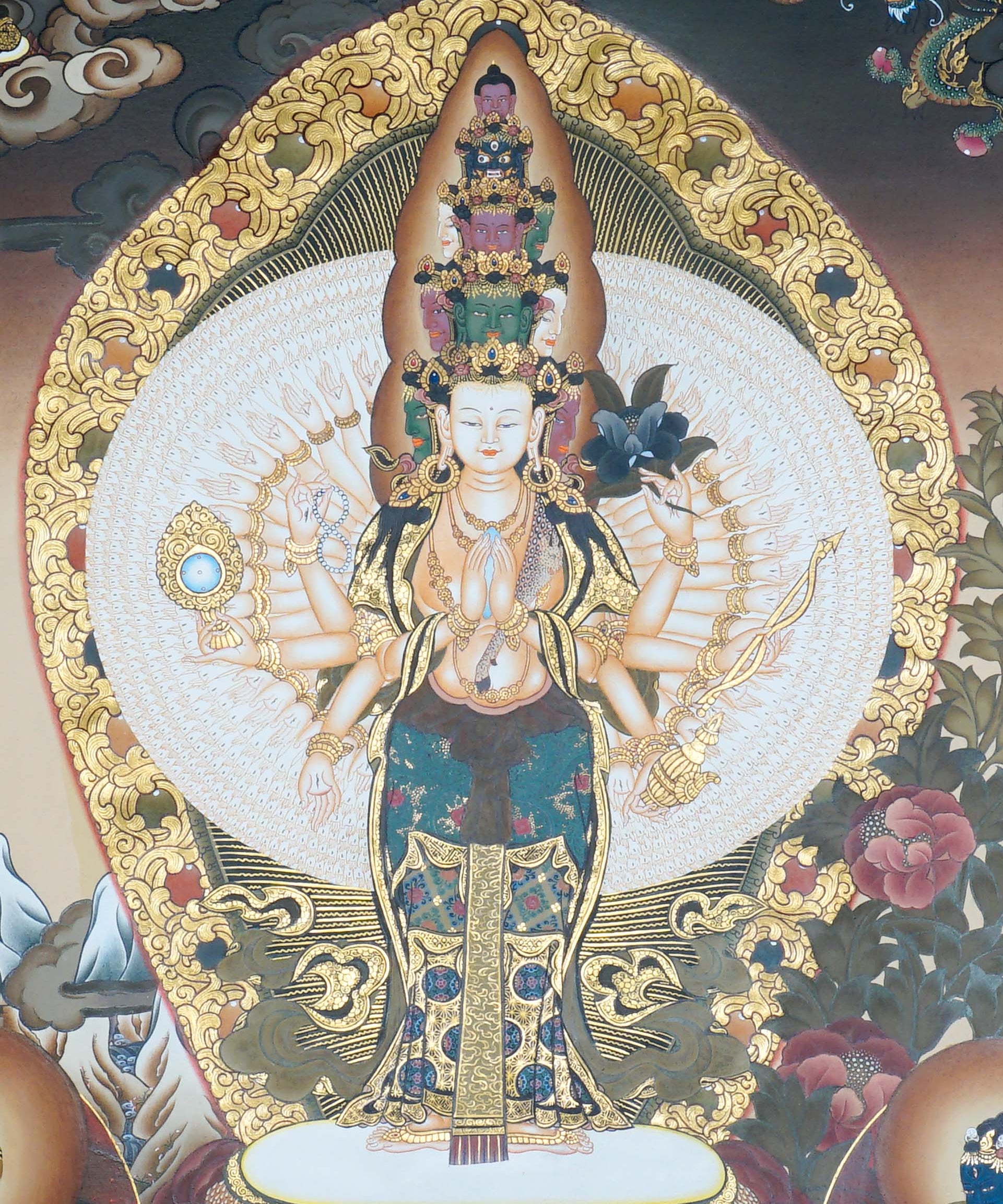 Avalokeshwor Thangka Painting showing Avalokiteshvara Chenrezig with many arms, lotus throne, surrounding deities and gold Himalayan Buddhist details.