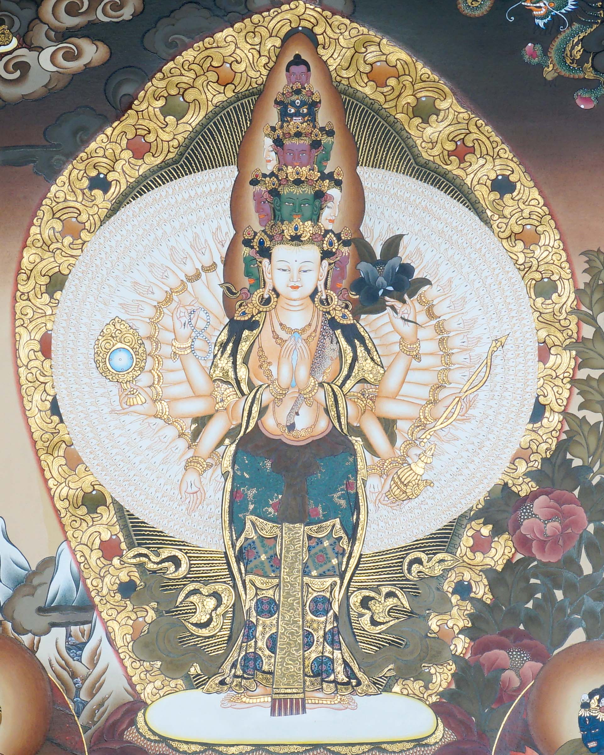 Avalokeshwor Thangka Painting showing Avalokiteshvara Chenrezig with many arms, lotus throne, surrounding deities and gold Himalayan Buddhist details.