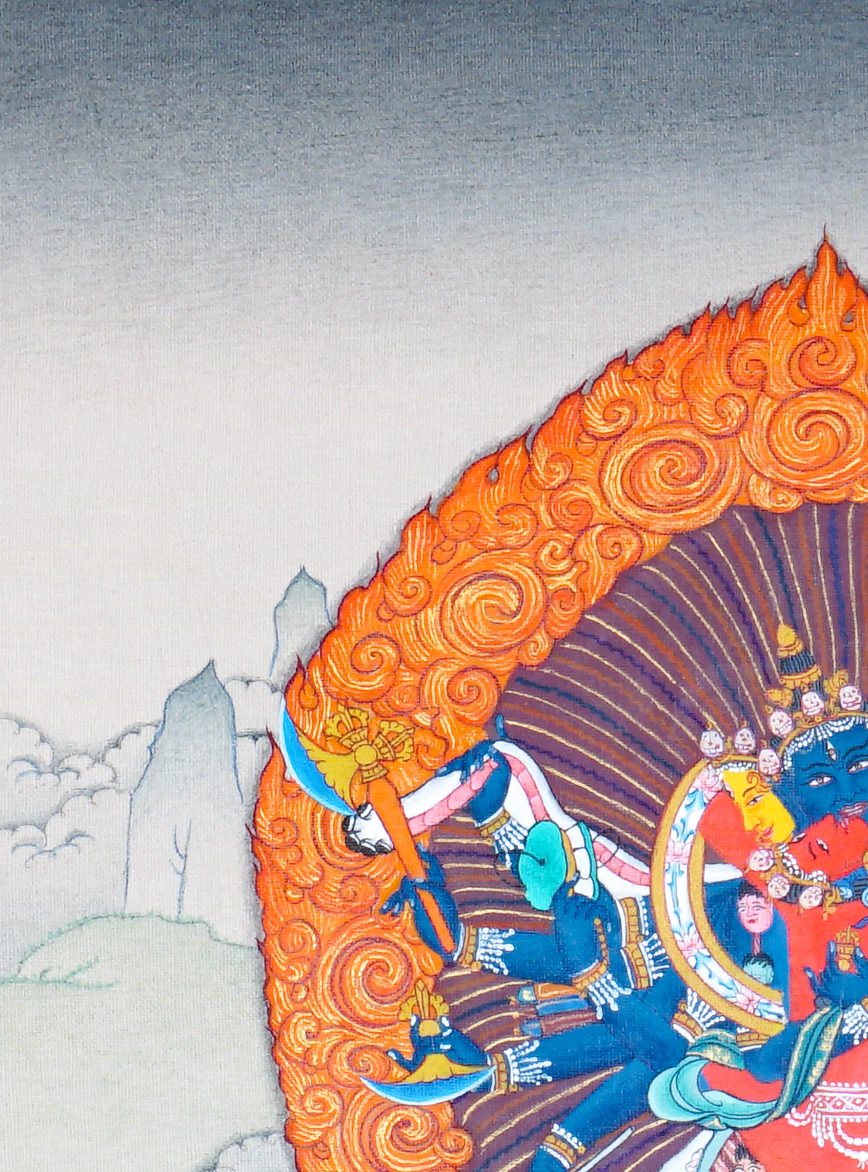 Chakrasamvara Thangka Painting showing Heruka in union with Vajravarahi, surrounded by a flame aura, ritual implements, lotus base and sacred Himalayan landscape details.