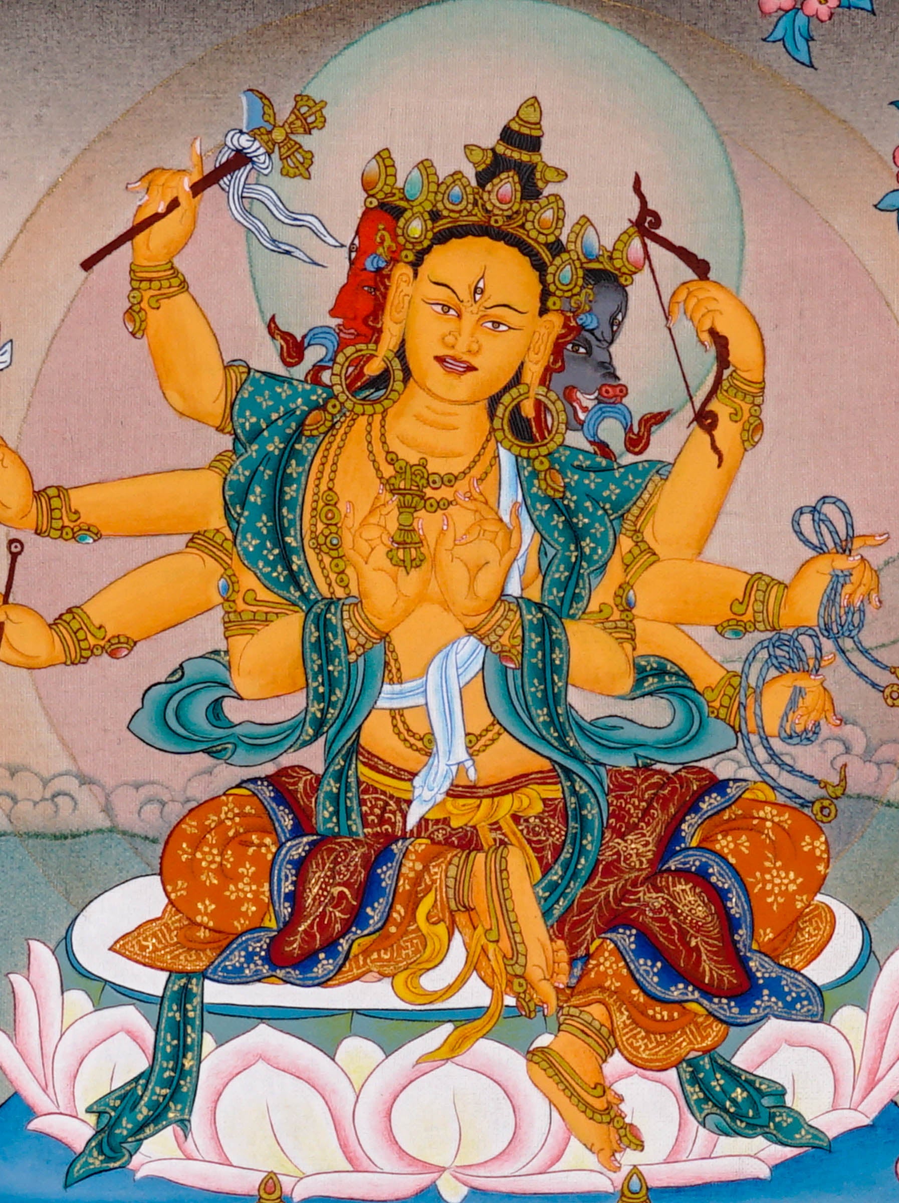 Marichi Oser Chenma thangka painting featuring the Buddhist goddess of light seated on a lotus throne with multiple arms, sacred implements, radiant halo and boar-drawn chariot