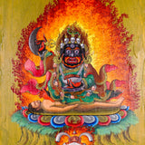Mahakala Oil Painting showing a wrathful Tibetan Buddhist Dharma protector with black face, skull crown, curved knife, skull cup, flame aura, lotus base, offering symbols and golden textured background.