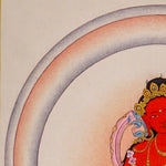 Red Tara thangka painting featuring Tara seated on a pink lotus throne with a lotus flower, radiant halo, ornaments