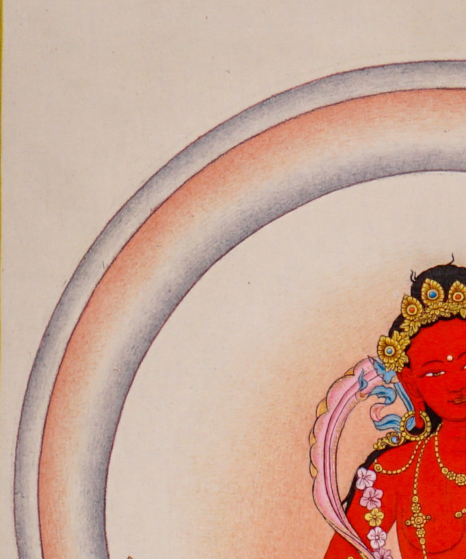 Red Tara thangka painting featuring Tara seated on a pink lotus throne with a lotus flower, radiant halo, ornaments