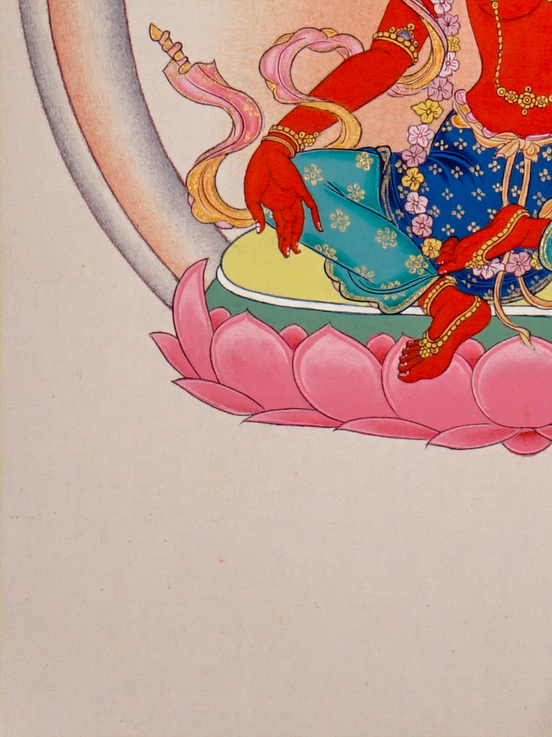 Red Tara thangka painting featuring Tara seated on a pink lotus throne with a lotus flower, radiant halo, ornaments