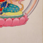 Red Tara thangka painting featuring Tara seated on a pink lotus throne with a lotus flower, radiant halo, ornaments