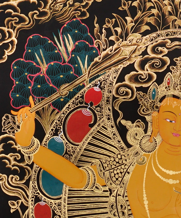 Manjushri Thangka painting with flaming sword, lotus throne, peacock, and Tibetan Buddhist wisdom symbolism.