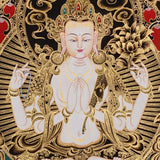 Chenrezig Thangka painting with gold detailing, Avalokiteshvara seated on lotus throne, floral motifs, and traditional Tibetan Buddhist compassion symbolism.