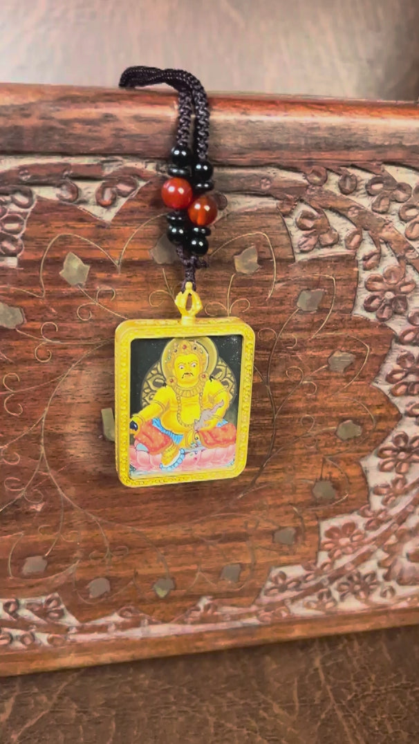 Yellow Zambala wealth deity thangka traditional Himalayan art