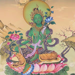Green Tara thangka painting Tibetan goddess seated on lotus holding blue lotus in detailed Himalayan landscape