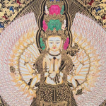 Thousand armed Avalokiteshvara thangka gold Chenrezig painting with multiple arms and faces in detailed traditional design