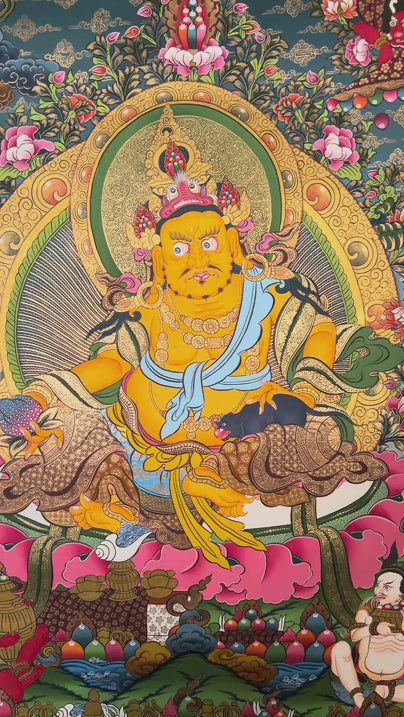 Yellow Zambhala thangka with Tibetan Buddhist wealth deity seated on lotus throne