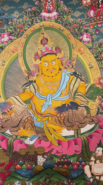 Yellow Zambhala thangka with Tibetan Buddhist wealth deity seated on lotus throne