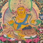 Yellow Zambhala thangka with prosperity deity seated on lotus throne