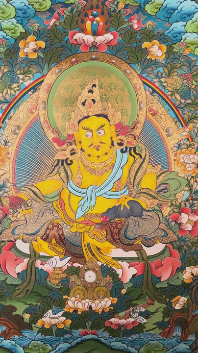 Yellow Zambhala thangka with Tibetan Buddhist wealth deity seated on lotus throne