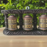 Wood Stand Prayer Wheel for home decor and spirituality.