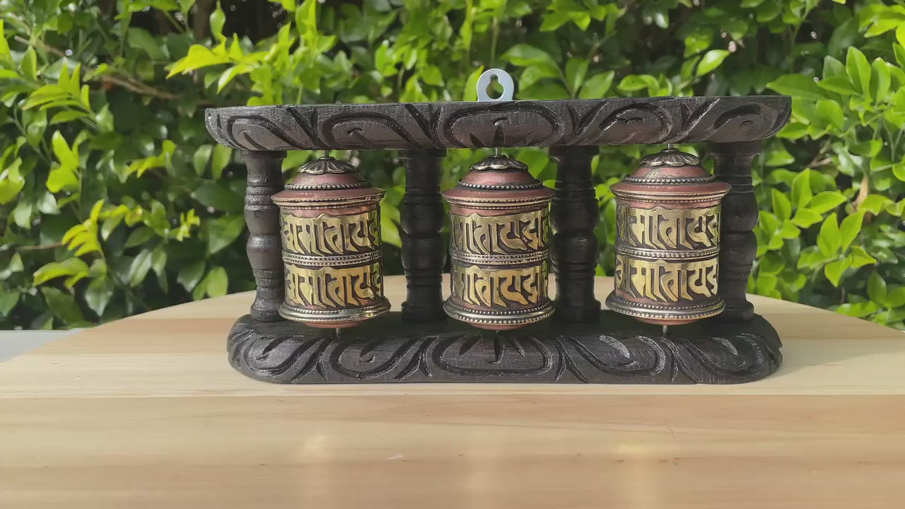 Wood Stand Prayer Wheel for home decor and spirituality.