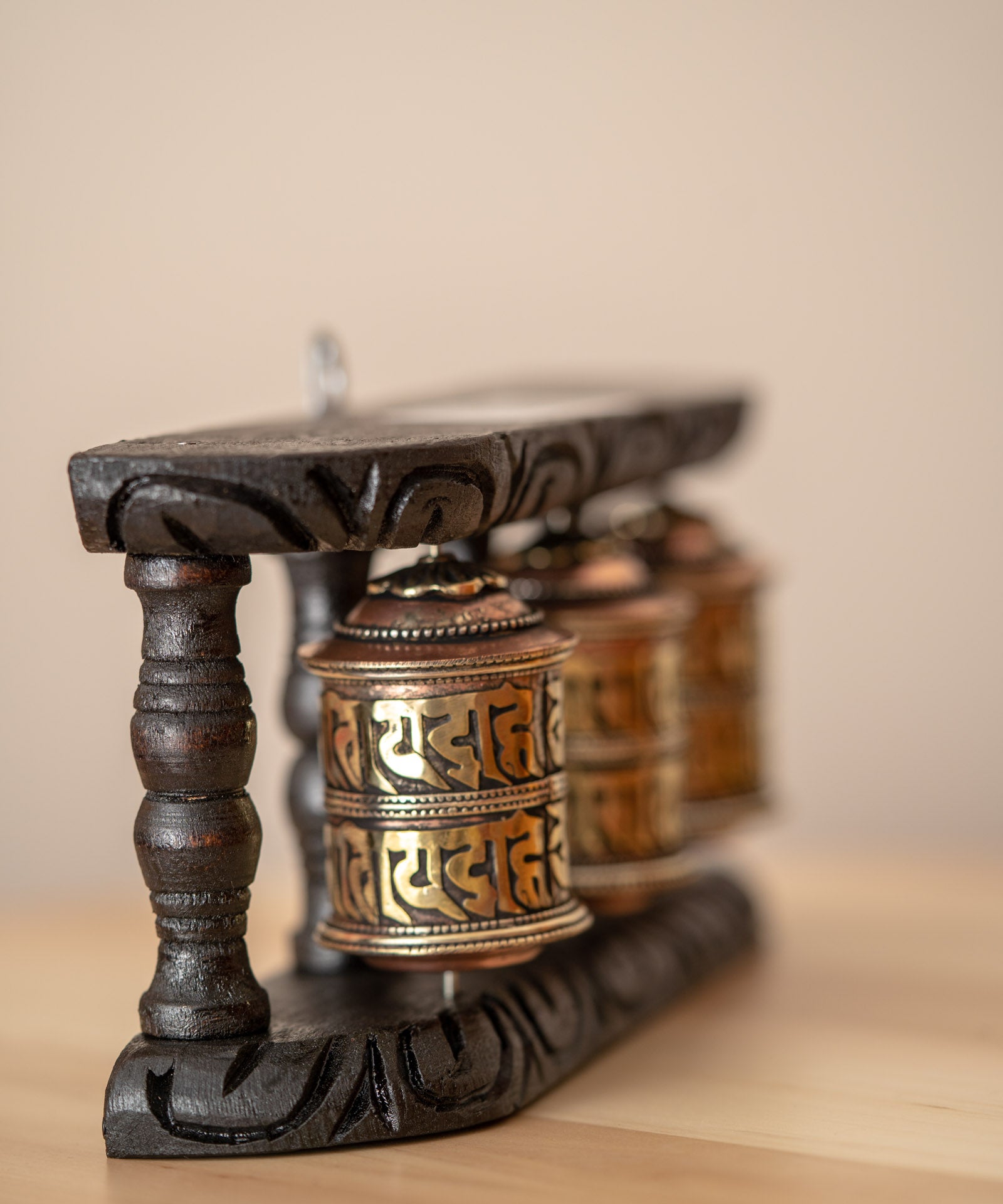 Wood Stand Prayer Wheel for home decor and spirituality.