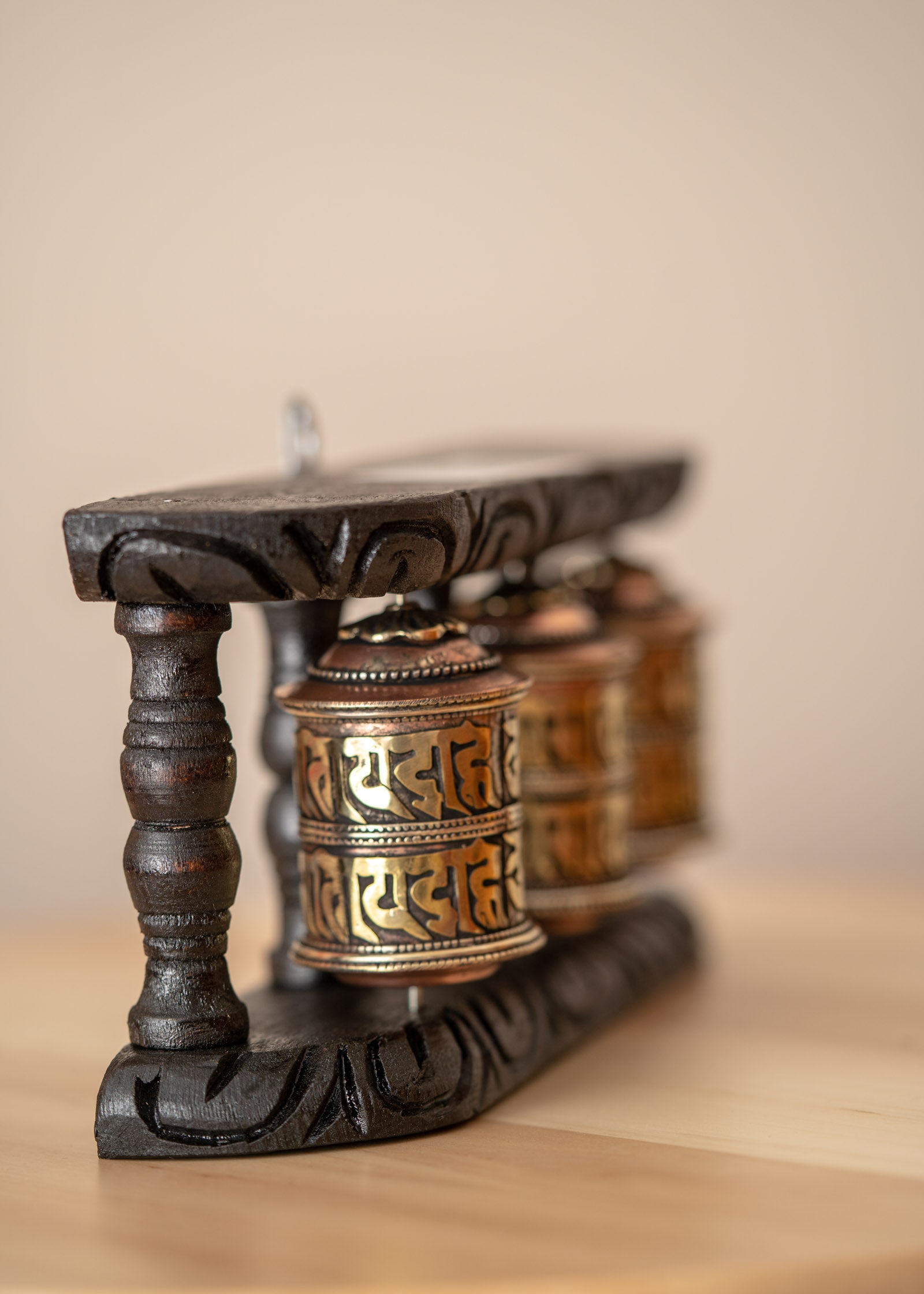 Wood Stand Prayer Wheel for home decor and spirituality.