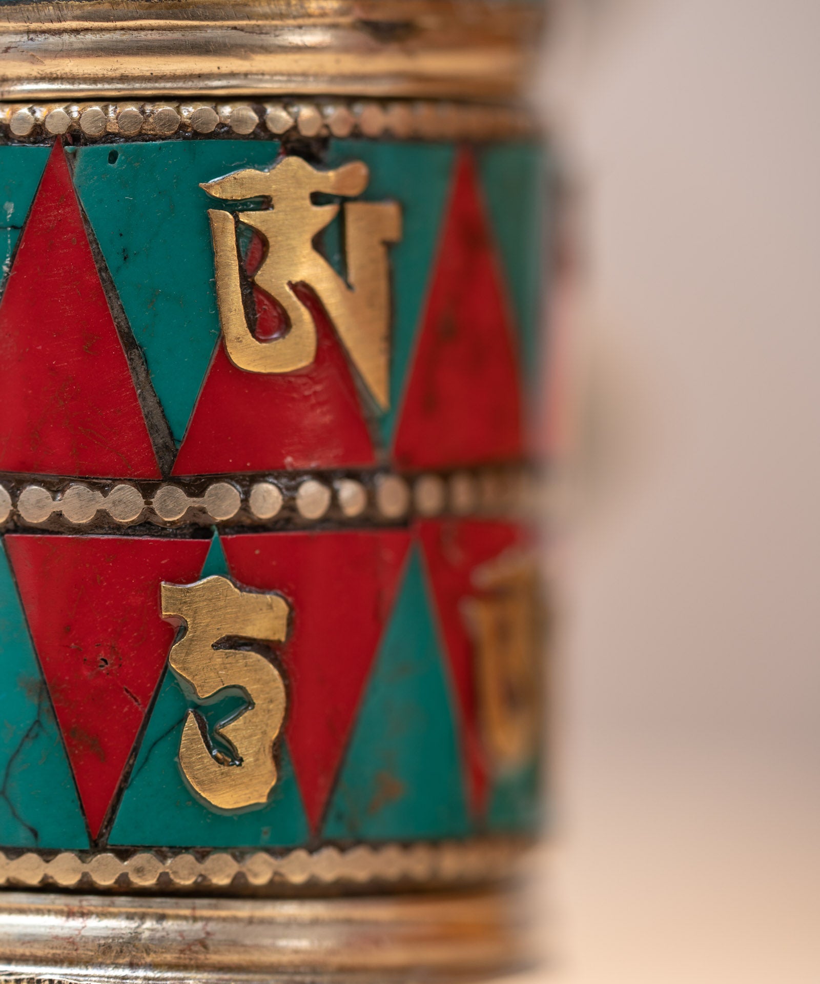 Prayer wheel with endless knot symbol for spiritual practice .