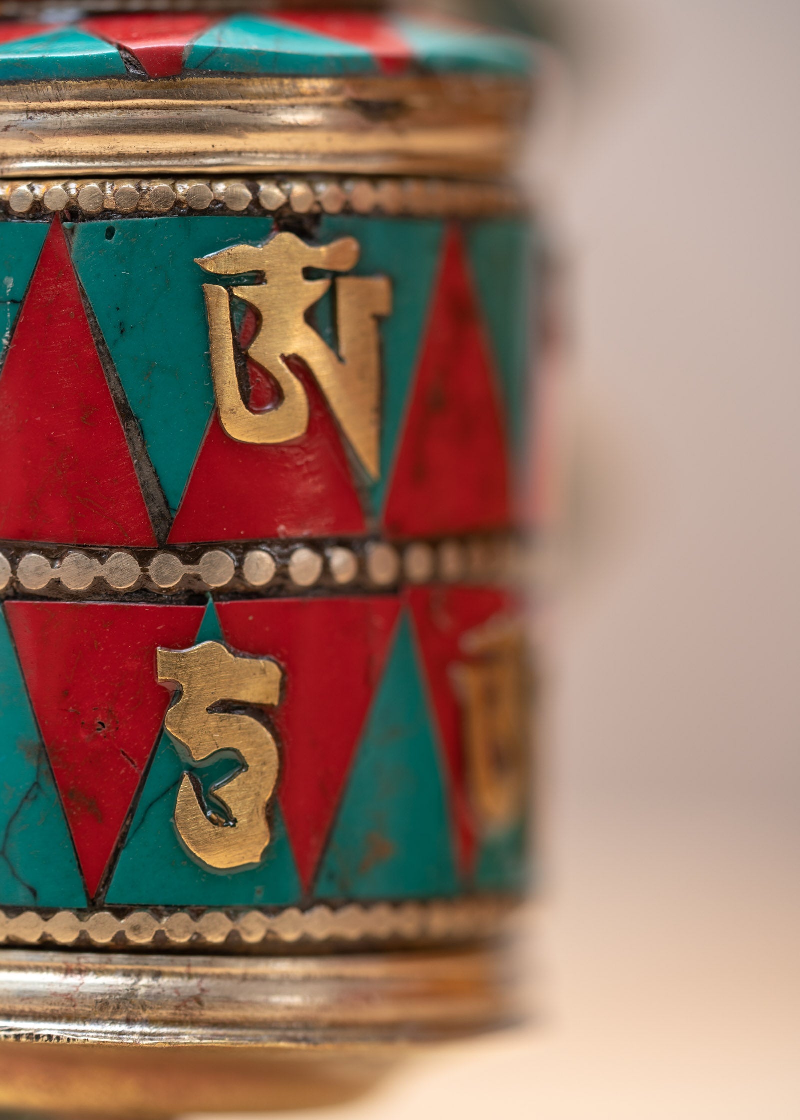 Prayer wheel with endless knot symbol for spiritual practice .