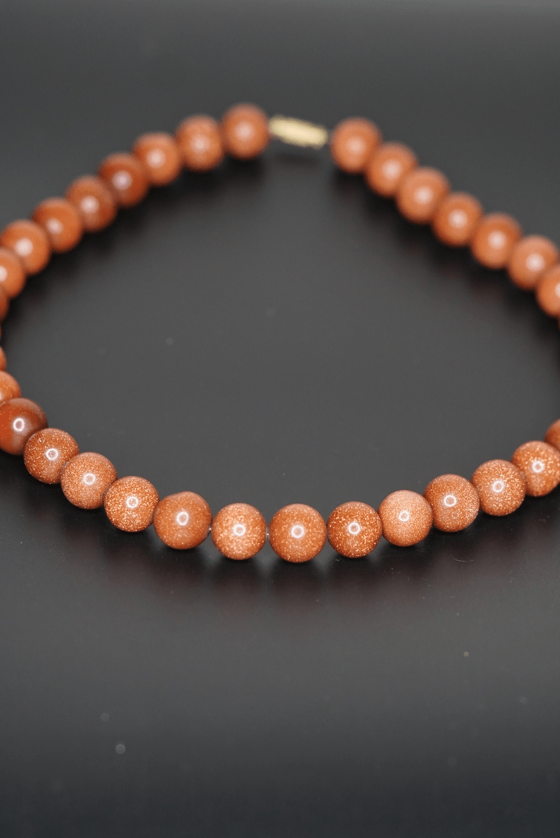 Goldstone Jewellery orange glittering necklace