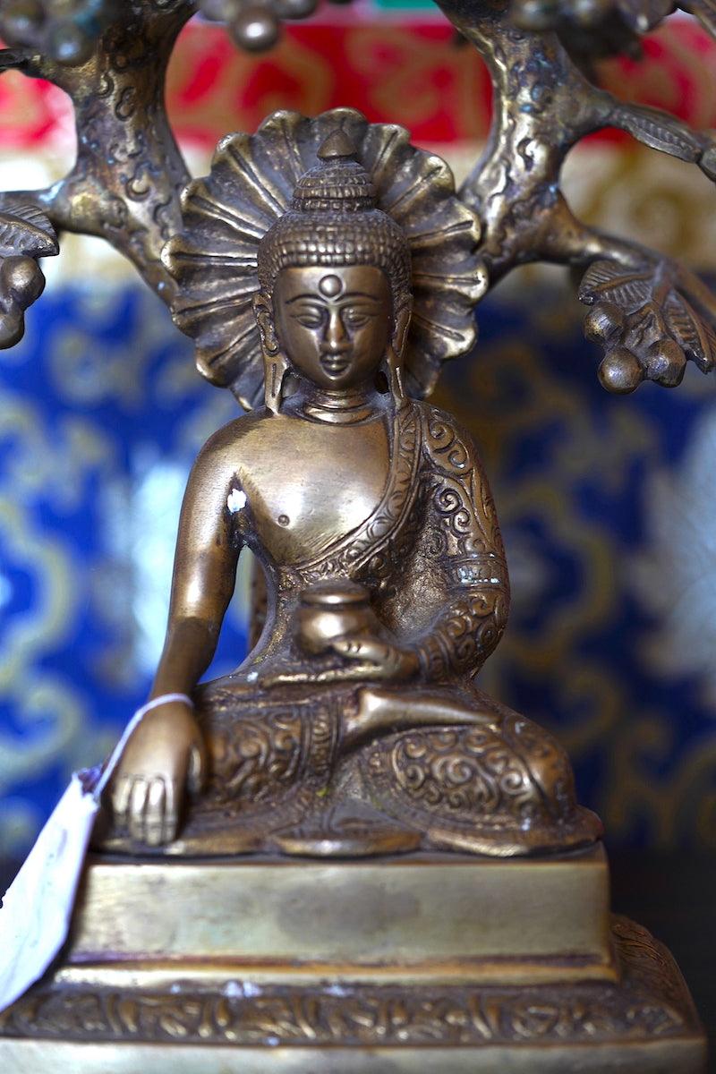 This Buddha Statue can be a beautiful art to decor at your home or on your altar space. The Crafts man has done an amazing job by showing the birds above the tree which depicts one of the form of Buddha before his Enlighetment.