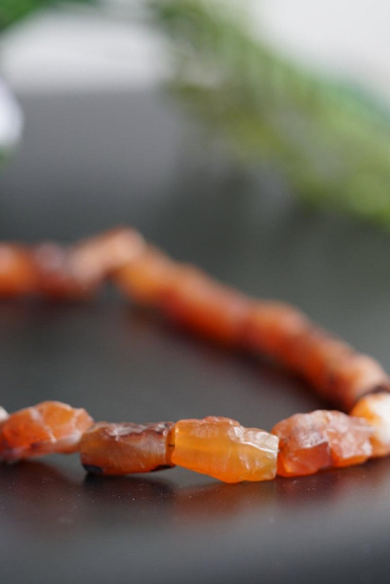 Raw Carnelian crystal necklace for healing sacral chakra