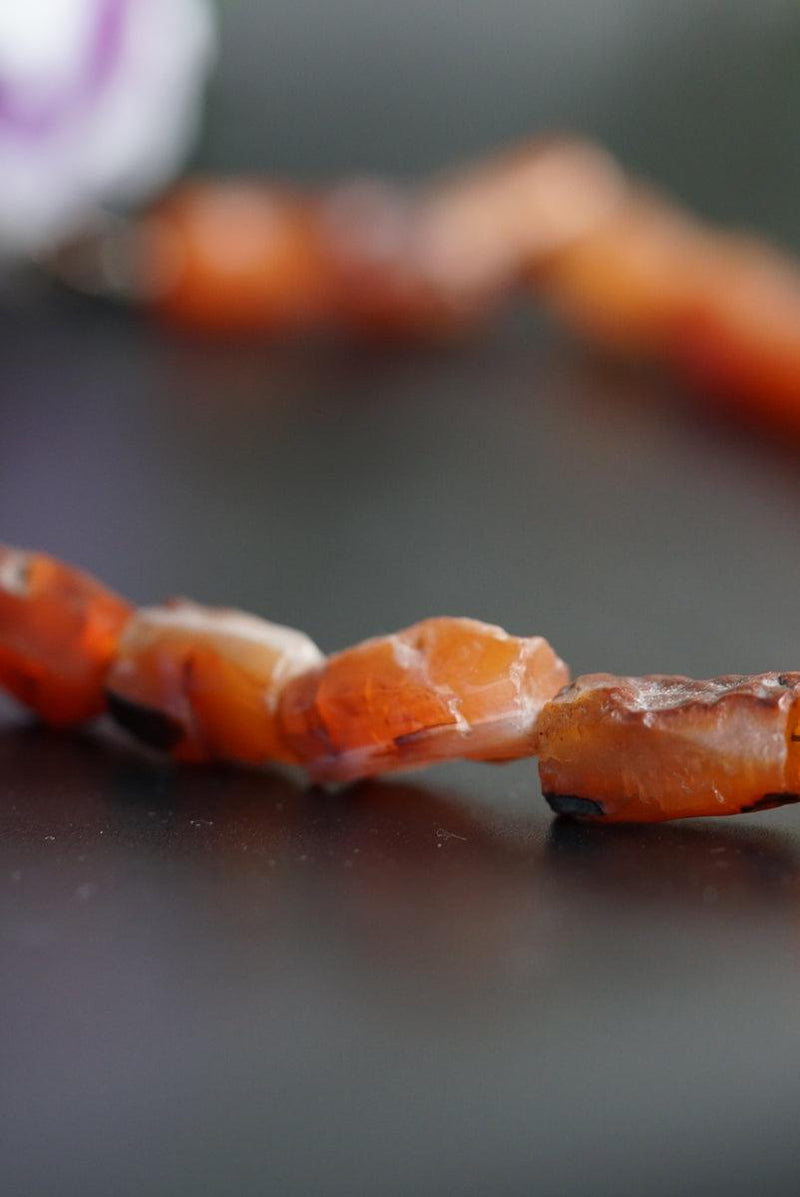 Raw Carnelian crystal necklace for healing sacral chakra