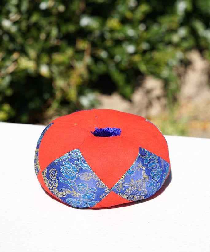Singing bowl cushion hand embroidery in silk from Nepal