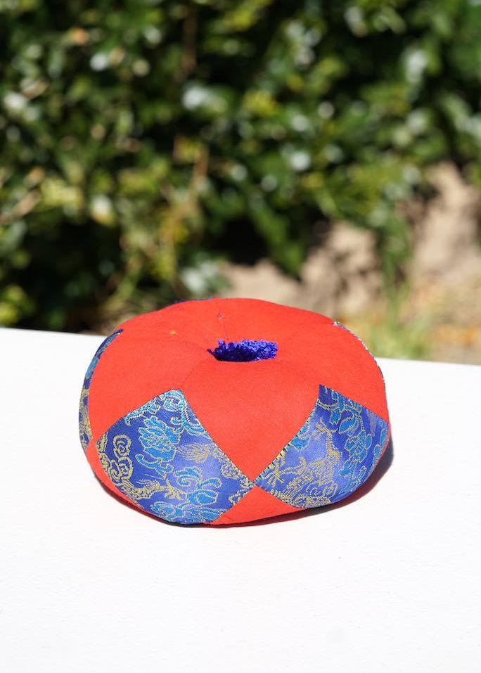 Singing bowl cushion hand embroidery in silk from Nepal