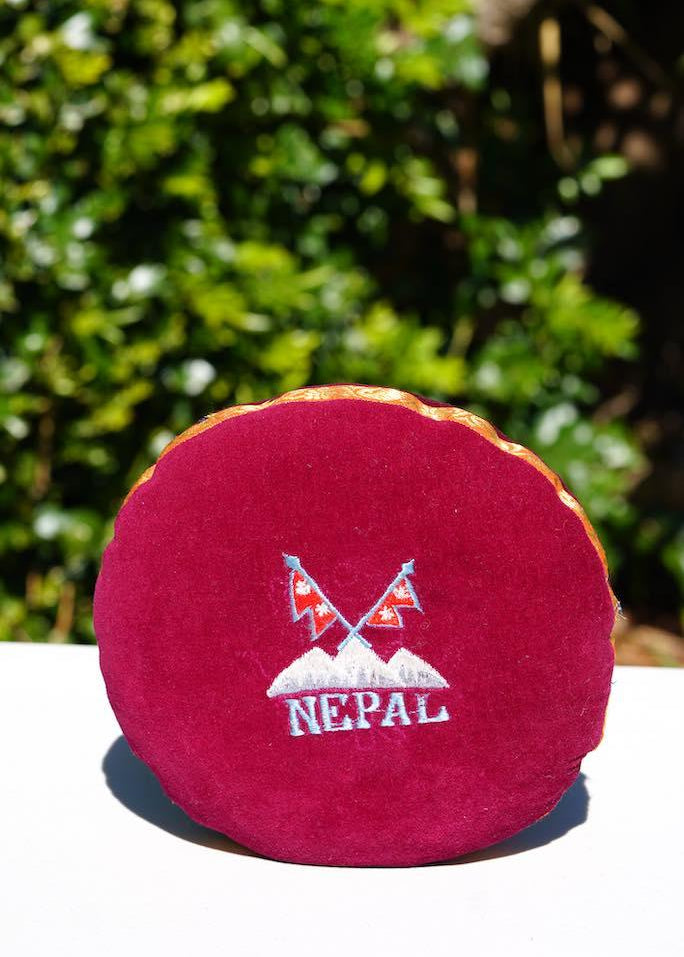 Singing bowl cushion hand embroidery in velvet Nepal