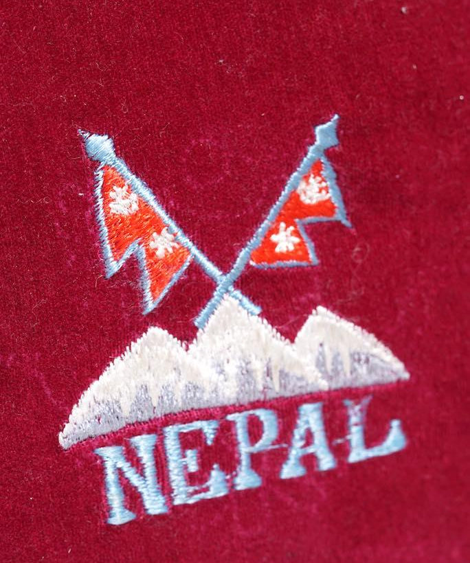 Singing bowl cushion hand embroidery in velvet Nepal