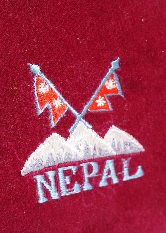 Singing bowl cushion hand embroidery in velvet Nepal