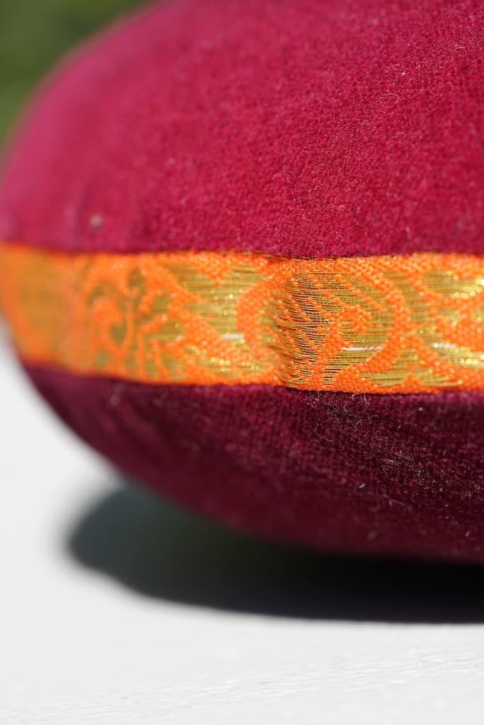 Singing bowl cushion hand embroidery in velvet