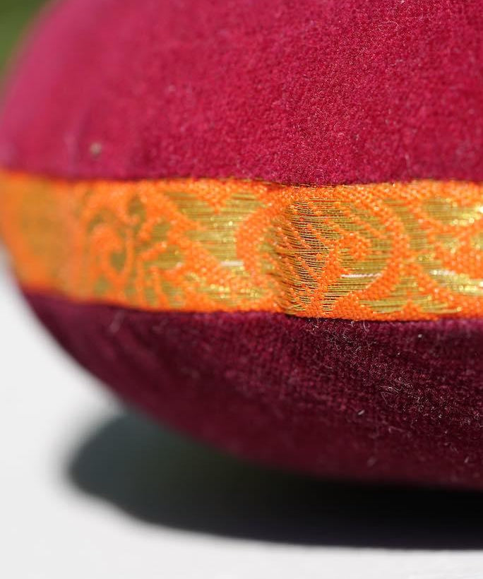 Singing bowl cushion hand embroidery in velvet