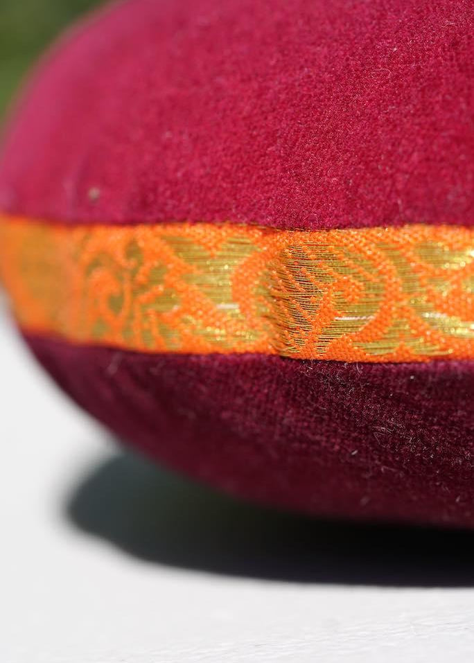 Singing bowl cushion hand embroidery in velvet