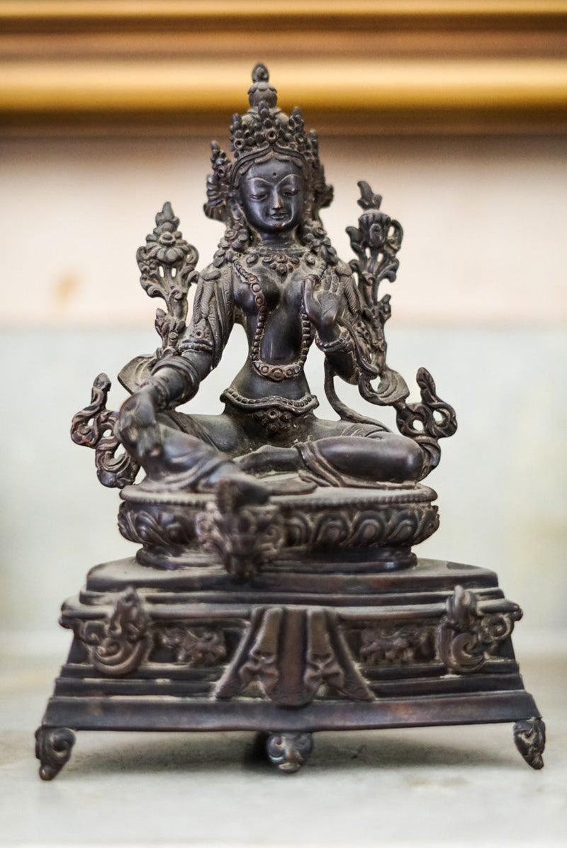 Green tara handmade by the artesian from Nepal. Black copper statue of Green Tara , female bodhisattva deity.