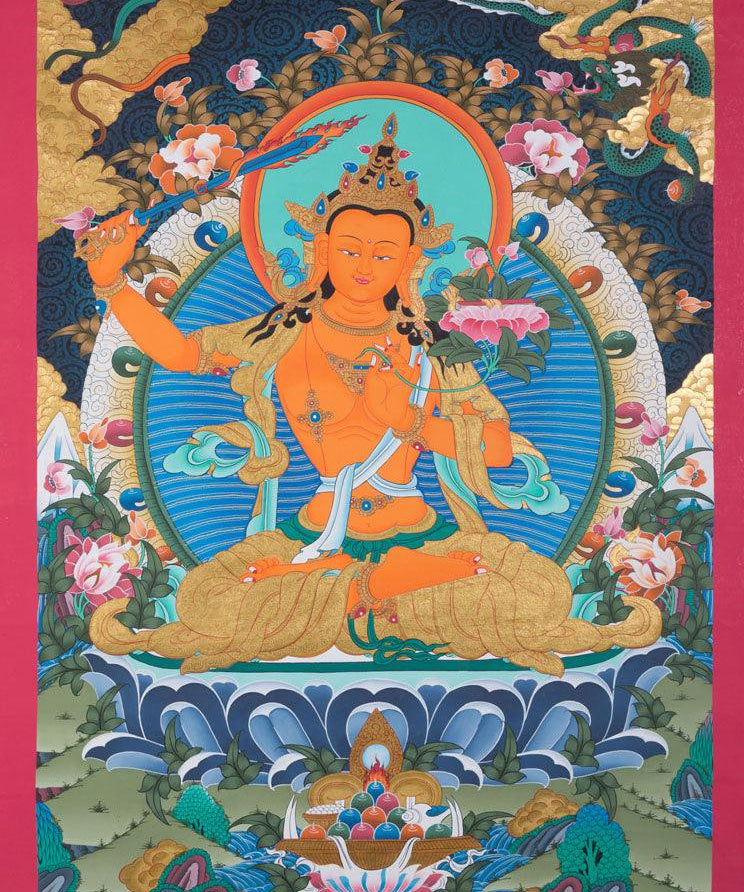 Manjushri is the Bodhisattva of transcendent wisdom. With the double-edged  sword on his right hand he cuts through the illusion and with his left hand holds a lotus with book of Prajna Paramita. 