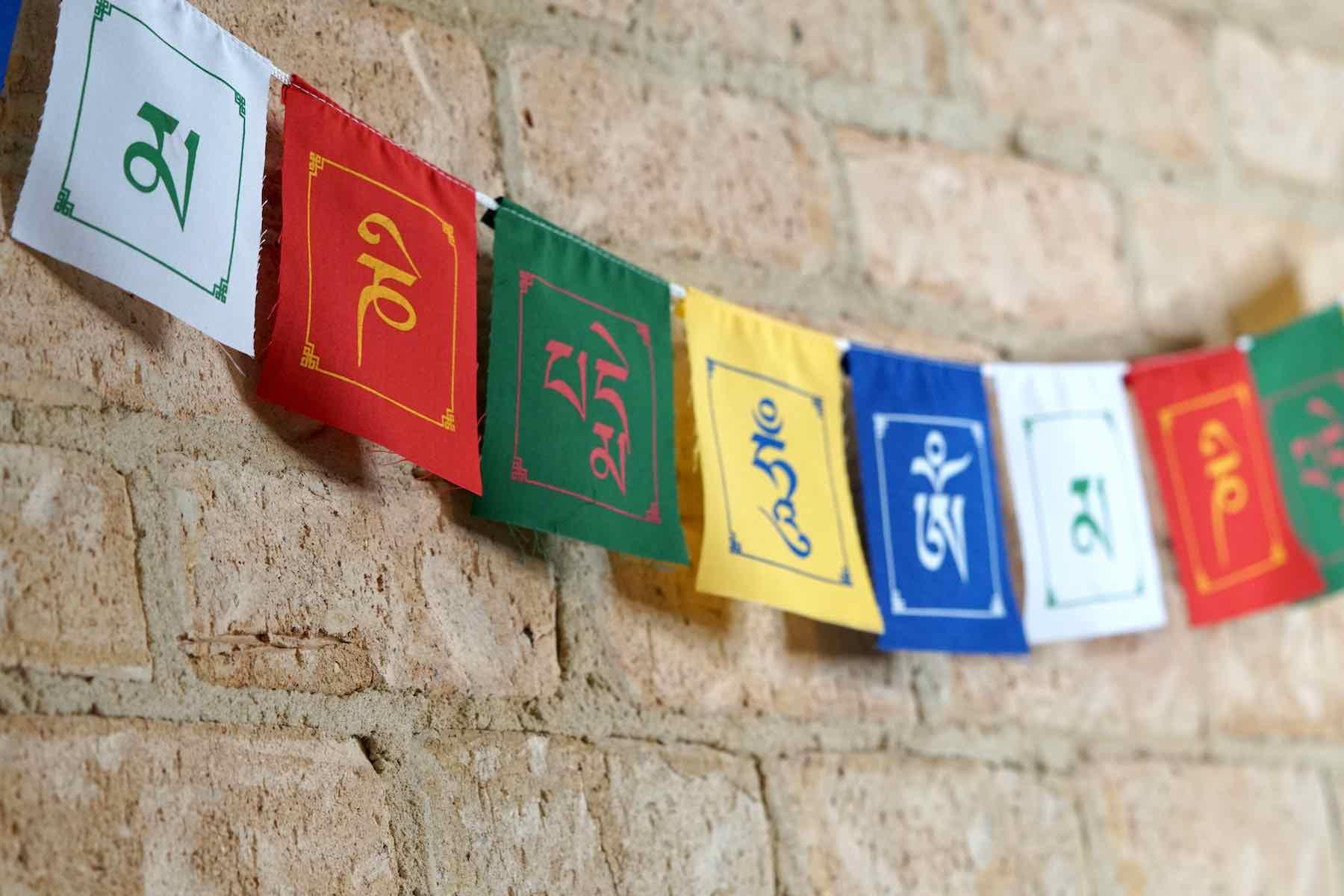 Himalayan singing bowl, prayer flag and bodhi seed bracelets for deep meditation, a perfect spiritual gift for father's day celebration.