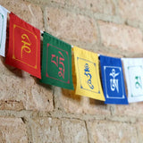 Himalayan singing bowl, prayer flag and bodhi seed bracelets for deep meditation, a perfect spiritual gift for father's day celebration.